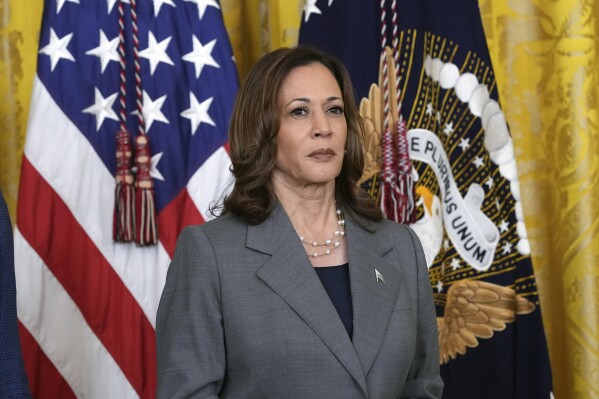 Vice President Kamala Harris listens during an event with President Joe Biden in the East Room of the White House in Washington, Thursday, Sept. 26, 2024, on gun violence in the United States. (AP Photo/Susan Walsh)