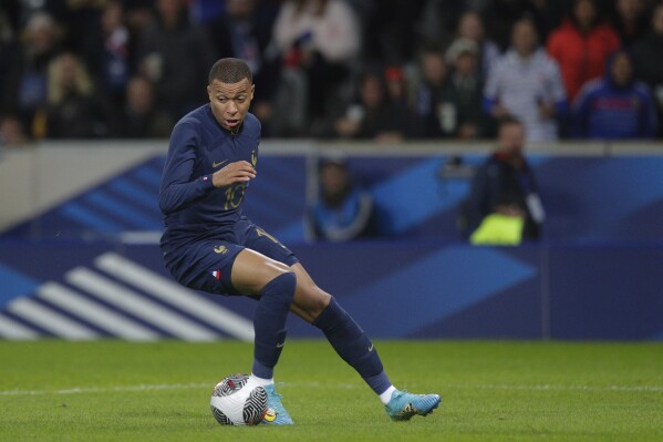 France's Kylian Mbappe controls the ball during the friendly soccer match between France and Scotland at the Pierre Mauroy stadium, in Villeneuve-d'Ascq, northern France, Tuesday, Oct 17, 2023. (AP Photo/Michel Spingler)