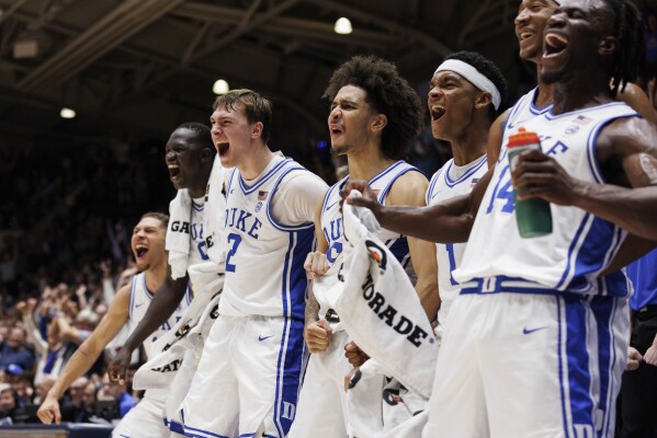 The Duke bench reacts to a play during the second half of NCAA college basketball exhibition game against Lincoln in Durham, N.C., Saturday, Oct. 19, 2024. (AP Photo/Ben McKeown)