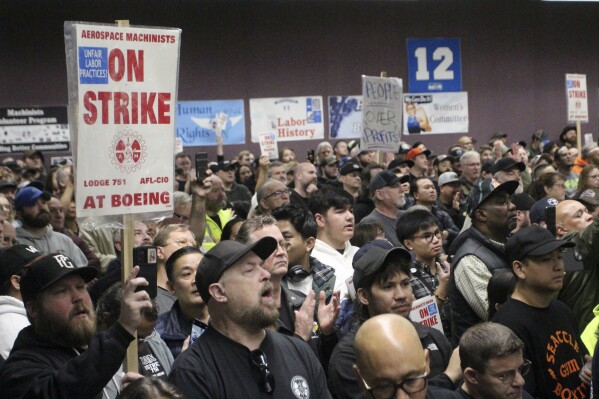 Boeing machinists, labor allies and elected officials rally in Seattle at their union hall on Tuesday, Oct. 15, 2024.(AP Photo/Manuel Valdes)