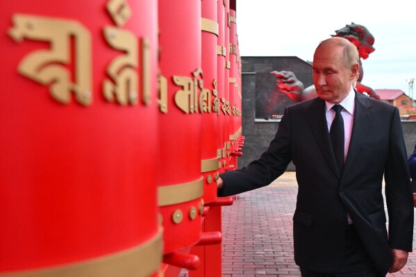 Russian President Vladimir Putin visits Tubten Shedrub Ling datsan in Kyzyl, Republic of Tyva, Russia, Monday, Sept. 2, 2024. (Kristina Kormilitsyna, Sputnik, Kremlin Pool Photo via AP)