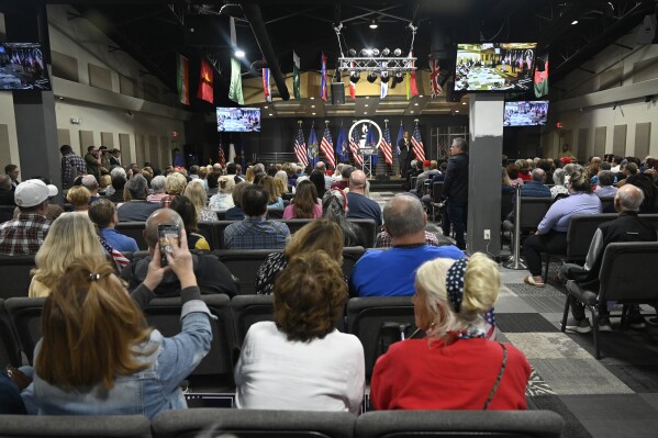 Ben Carson addresses supporters of Republican presidential nominee former President Donald Trump, Saturday, Oct. 5, 2024, in Livonia, Mich. (AP Photo/Jose Juarez)