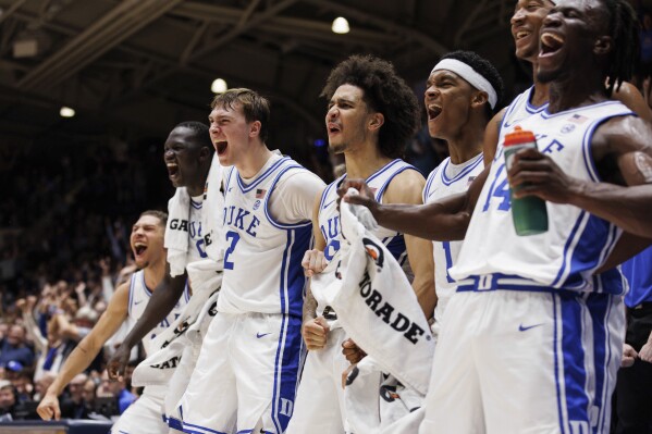 The Duke bench reacts to a play during the second half of NCAA college basketball exhibition game against Lincoln in Durham, N.C., Saturday, Oct. 19, 2024. (AP Photo/Ben McKeown)