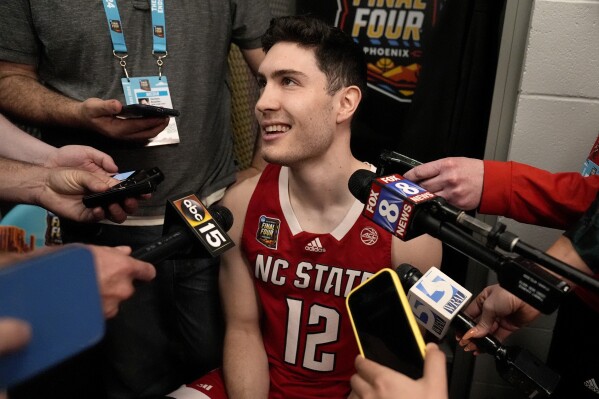 FILE - NC State guard Michael O'Connell talks with reporters ahead of a Final Four college basketball game in the NCAA Tournament, Thursday, April 4, 2024, in Glendale, Ariz. (AP Photo/Brynn Anderson, File )