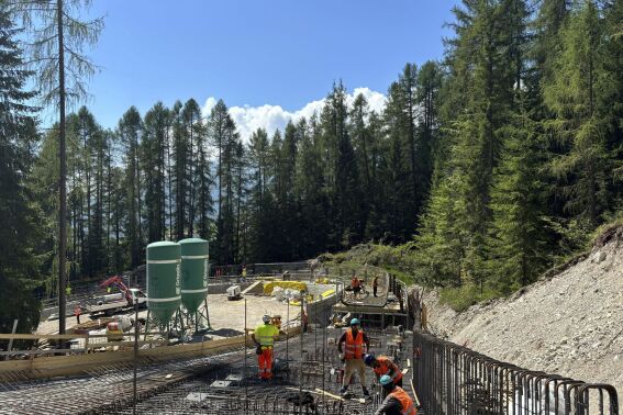 Construction crews work on the sliding center for the 2026 Milan-Cortina Olympics in Cortina d'Ampezzo, Italy, Aug. 8, 2024. (Simico (Società Infrastrutture Milano Cortina 2026) via AP)