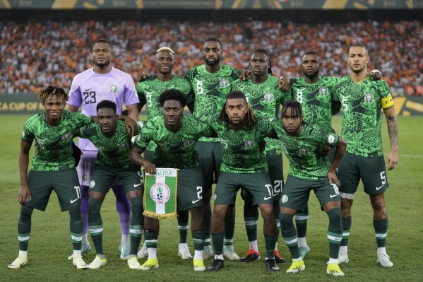 FILE- The Nigeria soccer team poses for a group photo before the African Cup of Nations final soccer match between Ivory Coast and Nigeria, at the Olympic Stadium of Ebimpe in Abidjan, Ivory Coast, Sunday, Feb. 11, 2024. (AP Photo/Themba Hadebe, File)