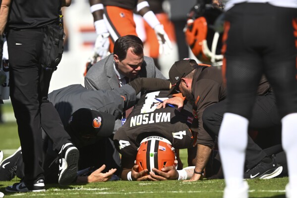 Cleveland Browns quarterback Deshaun Watson (4) reacts after being injured in the first half of an NFL football game against the Cincinnati Bengals, Sunday, Oct. 20, 2024, in Cleveland. (AP Photo/David Richard)