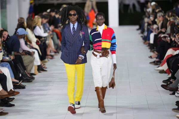 Models walk the runway during the Ralph Lauren Spring/Summer 2025 fashion show as part of New York Fashion Week on Thursday, Sept. 5, 2024, at Khalily Stables in Bridgehampton, N.Y. (Photo by Charles Sykes/Invision/AP)