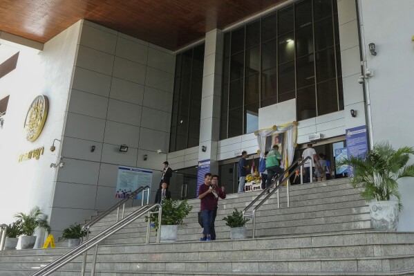 FILE - Peoples leave the Bangkok Criminal Court in Bangkok, Thailand, on Sept. 30, 2024. (AP Photo/Sakchai Lalit, File)