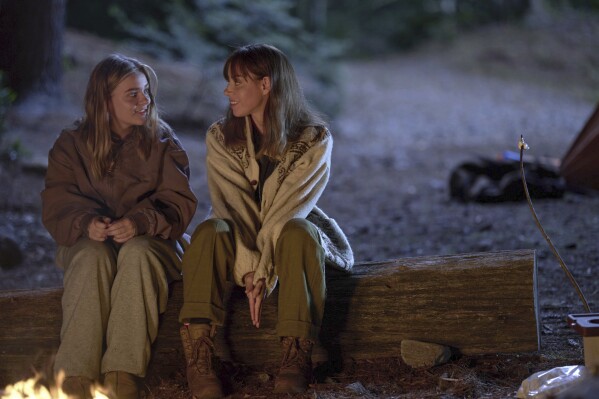 This image released by Amazon shows Maisy Stella, left, and Aubrey Plaza in a scene from "My Old Ass." (Amazon via AP)