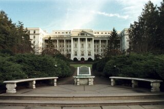 FILE - The Greenbrier Hotel, a five-star resort in White Sulphur Springs, W.Va., is seen on Nov. 30, 1998. West Virginia Gov. Jim Justice, a Republican candidate for U.S. Senate, is in a fight to keep his iconic Greenbrier Hotel. (AP Photo/Jon C. Hancock, File)