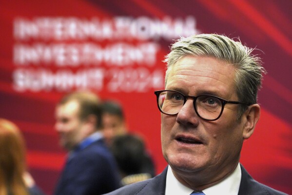 British Prime Minister Sir Keir Starmer speaks with leaders from across the UK during the International Investment Summit in London, Monday, Oct. 14, 2024. (Jonathan Brady/Pool Photo via AP)