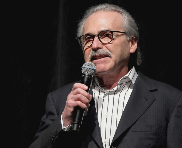 FILE - David Pecker, chairman and CEO of American Media, speaks at an event, Jan. 31, 2014 in New York. Testimony by the former National Enquirer publisher at Donald Trump's hush money trial this week has revealed an astonishing level of corruption at America's best-known tabloid and may one day be seen as the moment it effectively died. On Thursday, April 25, 2024 Pecker was back on the witness stand to tell more about the arrangement he made to boost Trump's presidential candidacy in 2016, tear down his rivals and silence any revelations that may have damaged him. (Marion Curtis via AP, File)