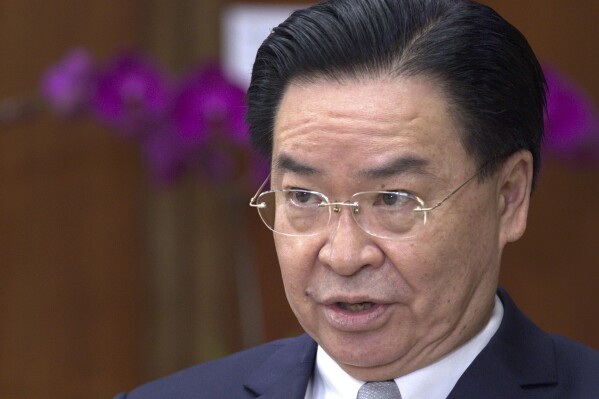 Taiwanese Foreign Minister Joseph Wu speaks during an interview with The Associated Press at his ministry in Taipei, Taiwan, Friday, May 17, 2024. (AP Photo/Chiang Ying-ying)