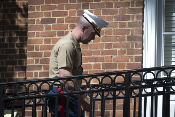 FILE - Marine Maj. Joshua Mast, arrives at Circuit Court for a hearing in an ongoing custody battle over an Afghan orphan, March 30, 2023 in Charlottesville, Va. (AP Photo/Cliff Owen, File)