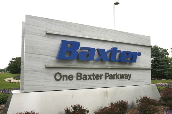 FILE - The sign outside Baxter International Inc. is seen in Deerfield, Ill., July 2009. (George LeClaire/Daily Herald via AP)