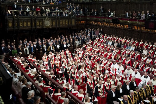 FILE - Members of the House of Commons and Lords during the State Opening of Parliament, in the House of Lords, in London, Tuesday, Nov. 7, 2023. (Aaron Chown/Pool Photo via AP, File)