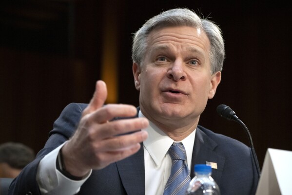 FILE - FBI Director Christopher Wray speaks during a hearing of the Senate Intelligence Committee on Capitol Hill, March 11, 2024, in Washington. Wray is set to testify about the bureau’s investigation into the attempted assassination of former President Donald Trump, with lawmakers at a congressional hearing likely to press him for fresh details about the gunman’s motive and background.(AP Photo/Mark Schiefelbein, File)