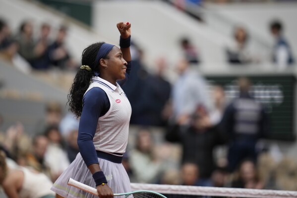 Coco Gauff of the U.S. celebrates after her their third round match of the French Open tennis tournament against Ukraine's Dayana Yastremska at the Roland Garros stadium in Paris, Friday, May 31, 2024. (AP Photo/Christophe Ena)