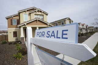 FILE - A "for sale" sign is posted in front of a home in Sacramento, Calif., March 3, 2022. Mortgage rates have been mostly ticking higher lately, but it’s not all bad news for home shoppers. (AP Photo/Rich Pedroncelli, File)