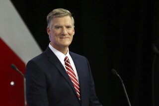 FILE - Republican hopeful for New Hampshire's 1st Congressional District Andy Sanborn attends a debate, Sept. 6, 2018, at St. Anselm College in Manchester, N.H. The former state senator was accused Wednesday, Aug. 30, 2023, of lying in order to get a COVID-19 relief loan for his casino and using the money to buy luxury cars for himself and his wife, a Republican leader in the New Hampshire House. (AP Photo/Elise Amendola, File)