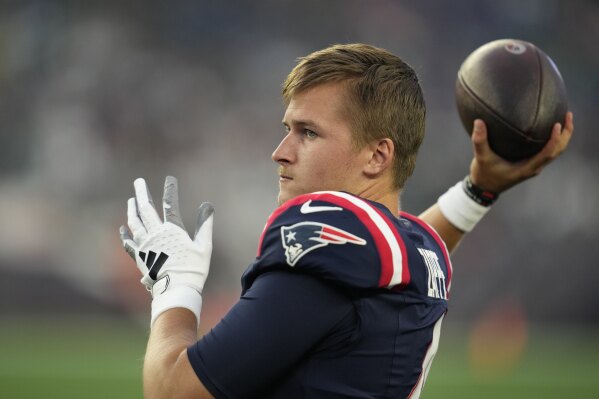 FILE - New England Patriots quarterback Bailey Zappe throws during warmup in the first half of an NFL preseason football game against the Philadelphia Eagles, Aug. 15, 2024, in Foxborough, Mass. (AP Photo/Charles Krupa, file)