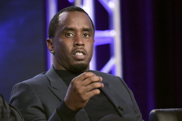 FILE -Sean 'Diddy' Combs participates in "The Four" panel during the FOX Television Critics Association Winter Press Tour in Pasadena, Calif., Jan. 4, 2018. (Photo by Richard Shotwell/Invision/AP, File)