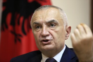 FILE - Albanian President Ilir Meta speaks during an interview with the Associated Press in Tirana, Albania, on April 21, 2021. (AP Photo/Hektor Pustina, File)