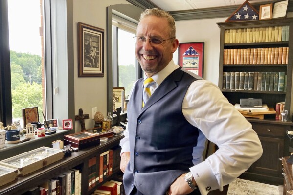 In this photo provided by Religion News Service, Pastor Clint Pressley stands for a portrait in his office at Hickory Grove Baptist Church in Charlotte, N.C., on July 21, 2024. (Yonat Shimron/RNS via AP)