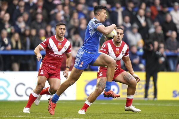 Samoa's Joseph Sua’ali’i in action during the Rugby League World Cup quarterfinal match between Tonga and Samoa at the Halliwell Jones Stadium, Warrington, England, Sunday Nov. 6, 2022. (Tim Goode/PA via AP)