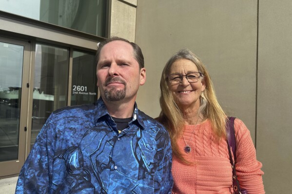 Richard Rogers and his wife Laurie are seen outside the James F. Battin Federal Courthouse, Tuesday, Oct. 1, 2024, in Billings, Mont. (AP Photo/Matthew Brown)