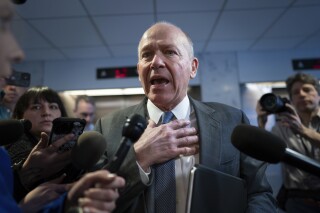 FILE - Boeing CEO David Calhoun speaks with reporters after a meeting at the Capitol in Washington, Jan. 24, 2024. U.S. lawmakers are expected to press Boeing's chief executive on Tuesday, June 18, 2024, about the company's latest plan to fix its manufacturing problems. (AP Photo/J. Scott Applewhite, File)