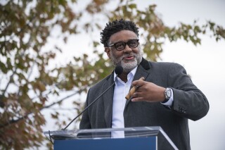 FILE - Detroit Riverfront Conservancy CFO William Smith addresses a large crowd before a ribbon cutting ceremony marking the official opening of the Uniroyal Promenade along the Detroit Riverwalk on Saturday, Oct. 21, 2023 in Detroit. (Katy Kildee/Detroit News via AP, File)