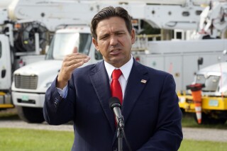 FILE - Florida Gov. Ron DeSantis gestures during a news conference, Wednesday, Sept. 25, 2024, at the Tampa Electric Company offices in Tampa, Fla. (AP Photo/Chris O'Meara, File)