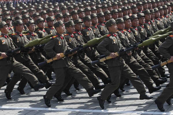 FILE - North Korean soldiers march during a mass military parade in Pyongyang's Kim Il Sung Square to celebrate 100 years since the birth of North Korean founder, Kim Il Sung on April 15, 2012. (AP Photo/Ng Han Guan, File)