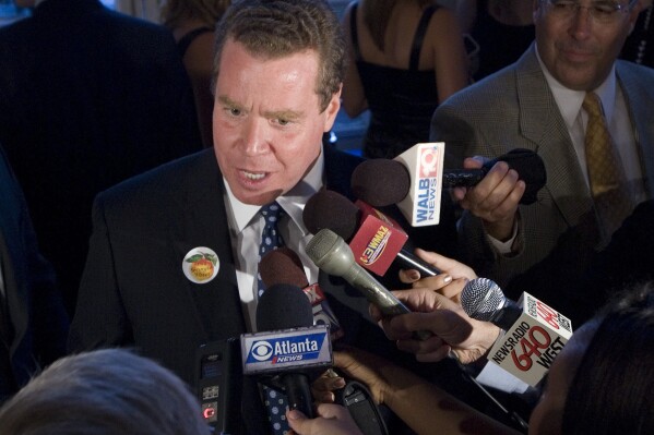 FILE - John Oxendine talks to reporters about his unsuccessful Republican bid for governor, July 20, 2010, in Atlanta. (AP Photo/John Amis, File)