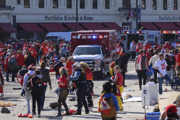 FILE - Police clear the area following a shooting at the Kansas City Chiefs NFL football Super Bowl celebration in Kansas City, Mo., Feb. 14, 2024. (AP Photo/Reed Hoffmann, File)