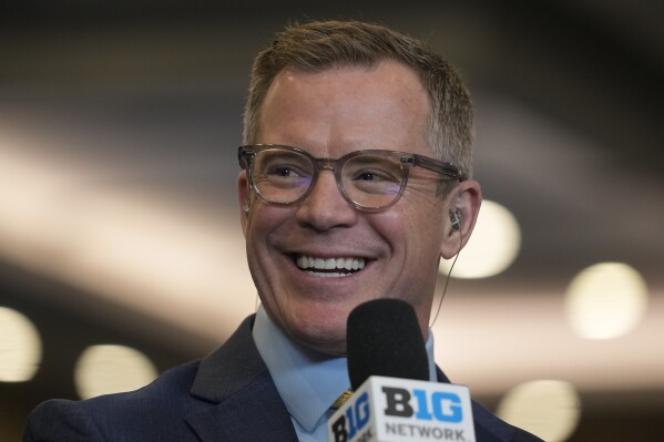 Michigan head coach Dusty May speaks during the Big Ten men's NCAA college basketball media day Thursday, Oct. 3, 2024, in Rosemont, Ill. (AP Photo/Erin Hooley)