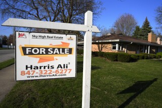 FILE - A for sale sign is displayed in front of a home in Skokie, Ill., April 14, 2024. (AP Photo/Nam Y. Huh, File)