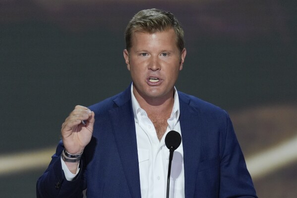 FILE - Tim Sheehy speaking during the second day of the Republican National Convention, July 16, 2024, in Milwaukee. (AP Photo/J. Scott Applewhite, File)