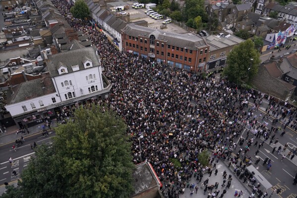 General view of people gathering to protest against a planned far-right anti-immigration protest in Walthamstow, London, Wednesday, Aug. 7, 2024 .(AP Photo/Alberto Pezzali)(AP Photo/Alberto Pezzali)