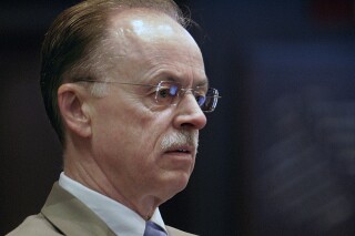 FILE - This Oct. 4, 2007 file photo shows Tim Mapes, chief of staff to Illinois House Speaker Madigan at the Illinois State Capitol in Springfield, Ill. A federal prosecutor has told jurors that evidence would show the former chief of staff lied to a grand jury to protect his boss. That assertion came during opening statements at the perjury and obstruction of justice trial in Chicago of Tim Mapes. He served for almost two decades as Madigan’s chief of staff. (AP Photo/Seth Perlman, File)