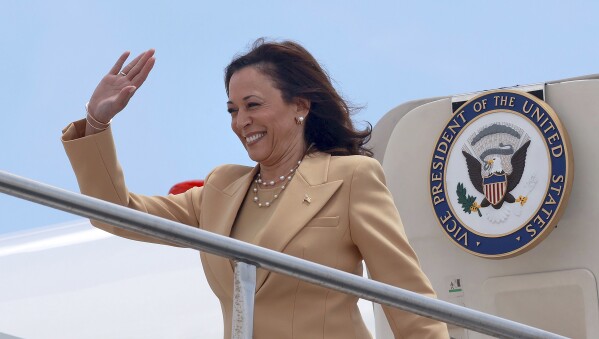 Vice President Kamala Harris arrives at Orlando International Airport ahead of attending the 20th Quadrennial Convention of the Women's Missionary Society of the African Methodist Episcopal (AME) Church, Tuesday, Aug. 1, 2023. The gathering at the Orange County Convention Center in Orlando is hosting 3,000 delegates from 39 countries. (Joe Burbank/Orlando Sentinel via AP)