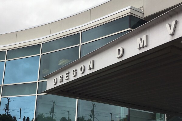 FILE - The headquarters of Oregon's Driver and Motor Vehicles Division is seen in Salem, Ore., June 15, 2017. (AP Photo/Andrew Selsky, File)