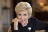 FILE - Actress Mitzi Gaynor poses in her apartment Wednesday, May 26, 2021, in Beverly Hills, Calif. Gaynor, among the last survivors of the so-called golden age of the Hollywood musical, died of natural causes in Los Angeles on Thursday, Oct. 17, 2024. She was 93. (AP Photo/Mark J. Terrill, File)