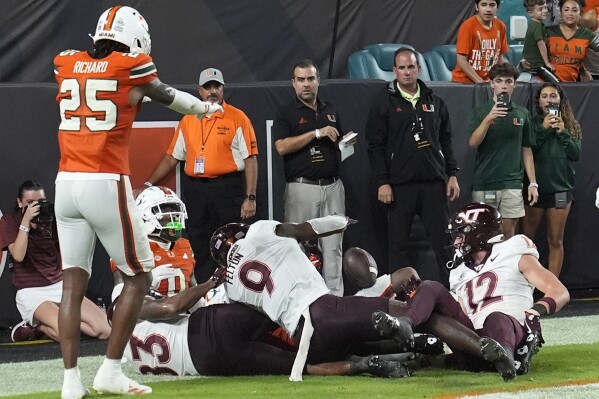 Virginia Tech wide receiver Da'Quan Felton (9) drops the ball after a last minute pass in the endzone during the second half of an NCAA college football game against Miami, Friday, Sept. 27, 2024, in Miami Gardens, Fla. (AP Photo/Marta Lavandier)