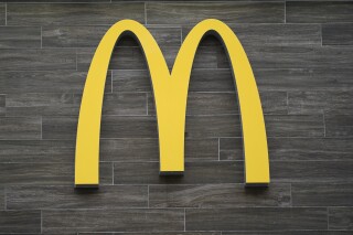 FILE - A McDonald's golden arches is shown at restaurant in Havertown, Pa., Tuesday, April 26, 2022. McDonald’s expects to open nearly 10,000 restaurants over the next four years, Wednesday, Dec. 6, 2023, a pace of growth that would be unprecedented even for the world's largest burger chain. (AP Photo/Matt Rourke)