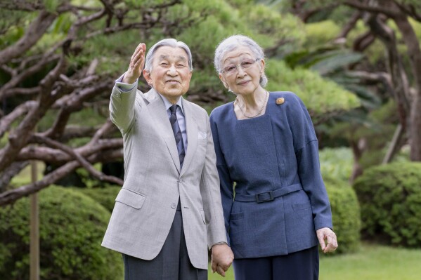 In this photo provided by the Imperial Household Agency of Japan, its Emperor Emeritus Akihito and Empress Emerita Michiko pose for a photograph at their residence in Tokyo, Japan, Friday, Oct. 4, 2024, ahead of Michiko's 90th birthday Sunday. (Imperial Household Agency of Japan via AP)