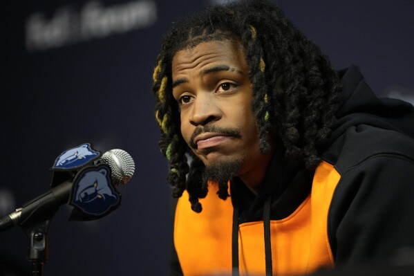 Memphis Grizzlies guard Ja Morant responds to questions during a news conference after the NBA basketball team's practice Friday, Dec. 15, 2023, in Memphis, Tenn. (AP Photo/George Walker IV)