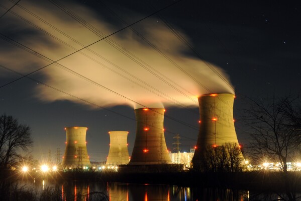 FILE - The Three Mile Island nuclear power generating station shown, March 28, 2011, in Middletown, Pa. (AP Photo/Bradley C Bower, File)